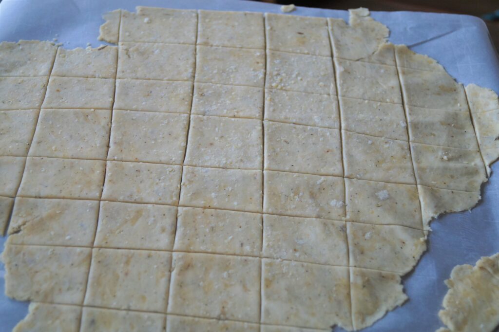 cracker dough cut into squares