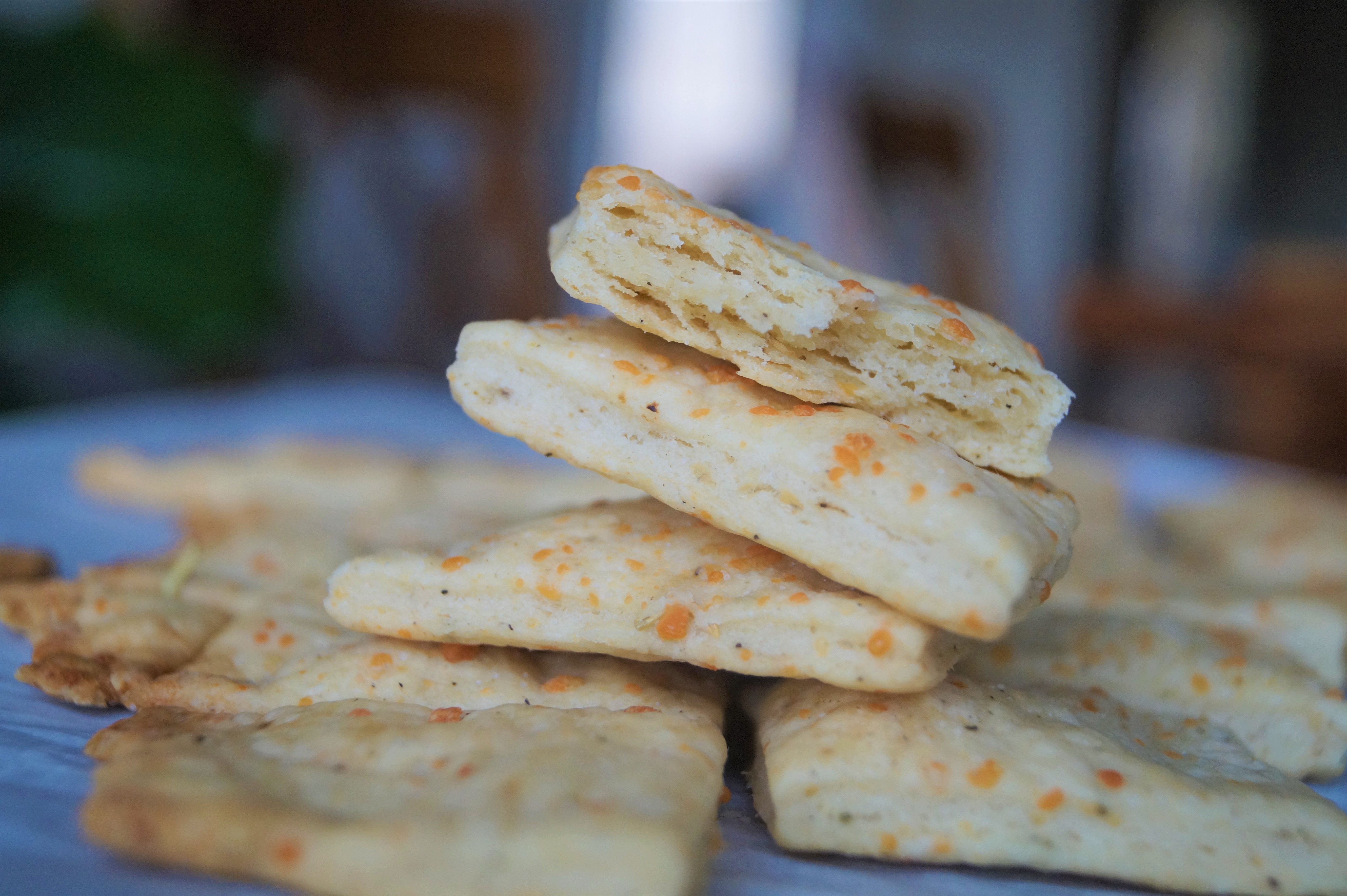 stack of rosemary parmesan sourdough crackers 