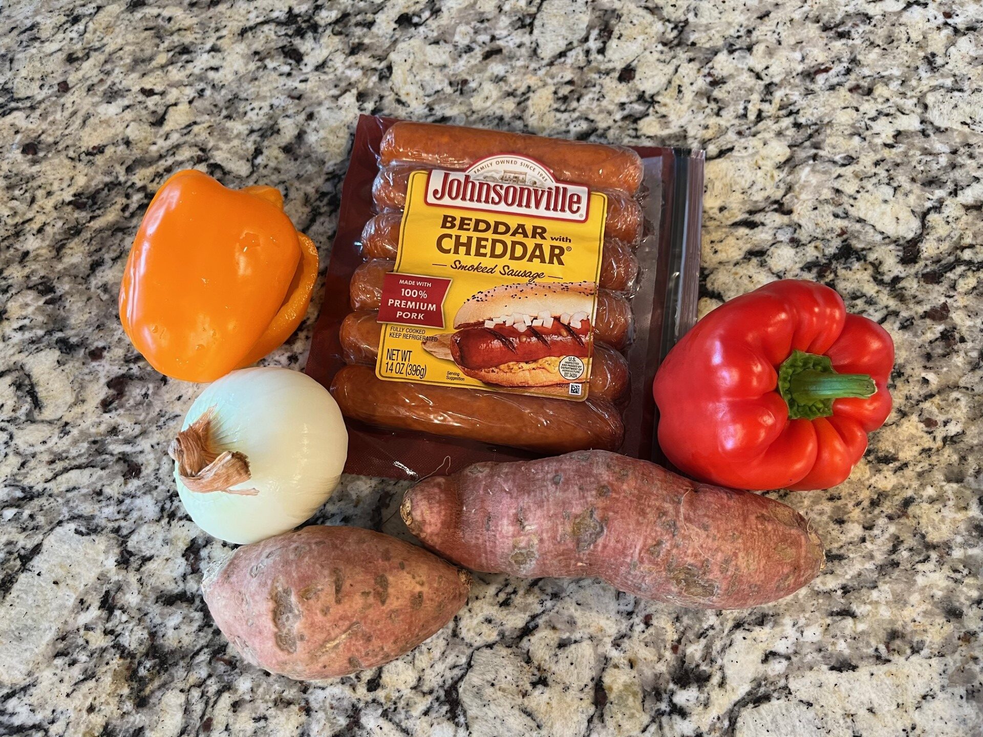 bell peppers, onion, sweet potato, sausage raw ingredients 