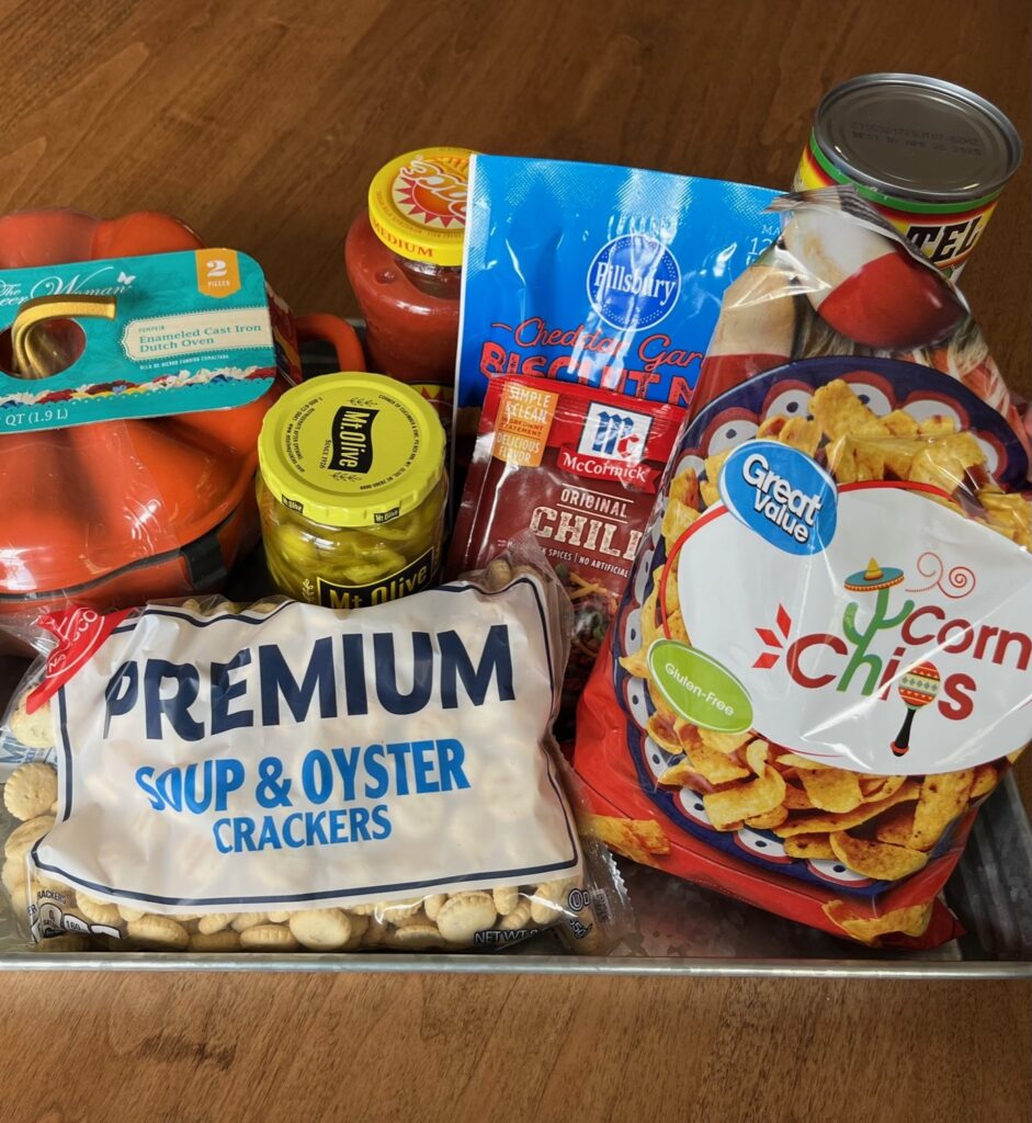 ingredients for chili charcuterie board placed on metal tray